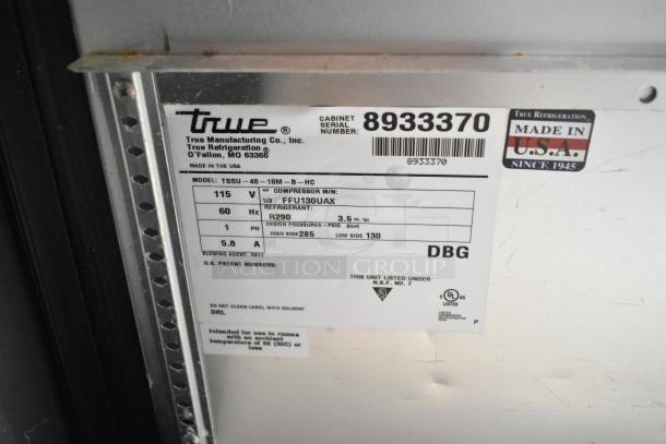 Label on 2016 True TSSU-48-18MB-HC commercial sandwich salad prep table. Details model, voltage, and refrigerant. Made in USA.