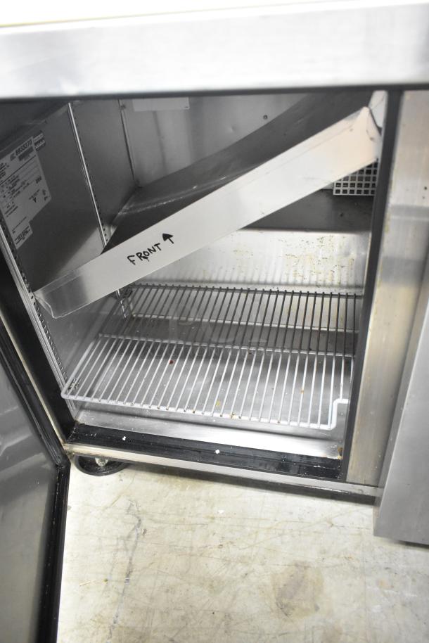 2016 True TSSU-48-18MB-HC prep table interior, stainless steel, wire racks, "Front" label visible, on commercial casters.