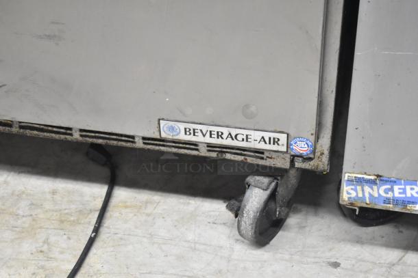 Beverage Air SPE48-18M-HMP prep table on commercial casters, visible branding. Shows signs of use. 115 Volts, 1 Phase.