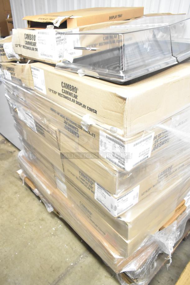 Boxes of 72 brand new Cambro RD1220CWH135 display covers and DT1220CW110 trays. Packed on pallet, labeled "Camwear".