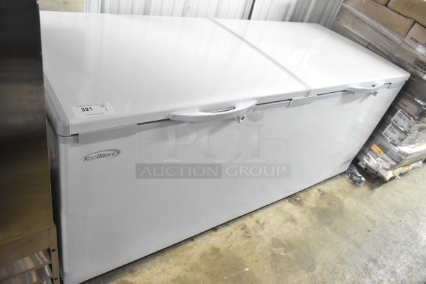 Brand new KoolMore SCF-24C commercial chest freezer, 24 cu ft, 115V, with minor scratches and dents visible.