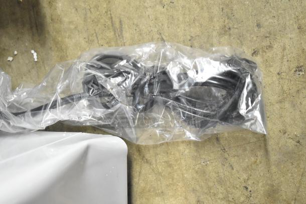 KoolMore SCF-24C commercial chest freezer, 24 cu ft, new with minor blemishes. Packaged power cord visible.