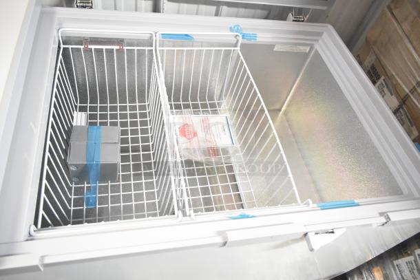 KoolMore SCF-24C Commercial Chest Freezer, 24 cu ft, 115V, new with minor scratches, includes baskets and manuals.