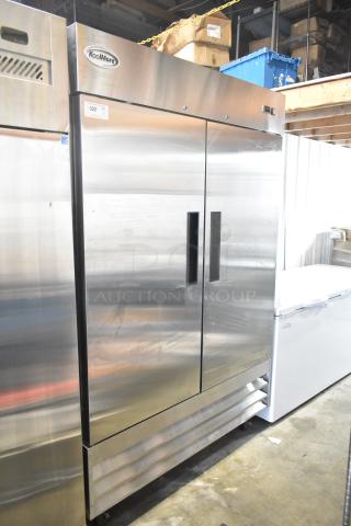 New KoolMore RIR-2D-SS 2-door commercial cooler, stainless steel, on casters, 115 Volts, slight scratches visible.
