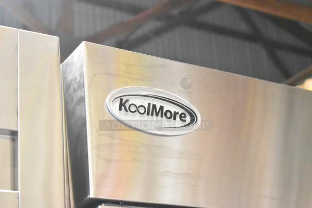 KoolMore RIR-2D-SS commercial cooler corner, showing steel finish and brand logo. New scratch and dent condition.
