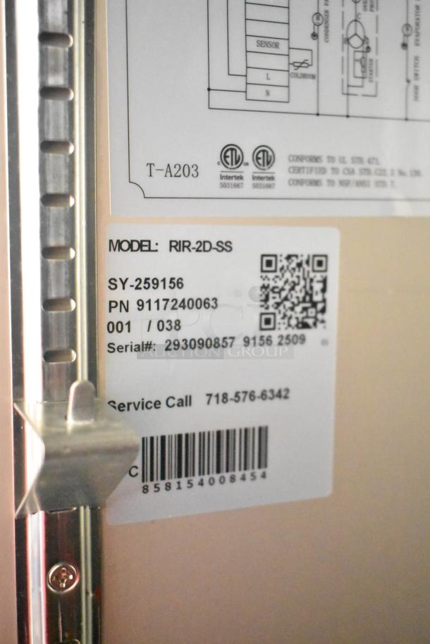 Label on KoolMore RIR-2D-SS cooler showing model, serial number, and service contact details.