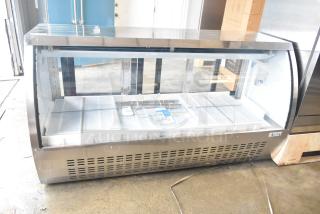 Brand new Avantco 178DLC82HCS refrigerated deli case with curved glass, 115V, 1 Phase; note scratch and broken glass.