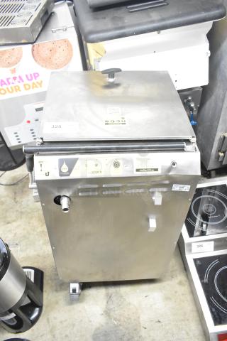 Brand new Vito XM mobile fryer oil filter system, 137 lb. capacity, 100-120 volts, 1 phase, with visible dents.