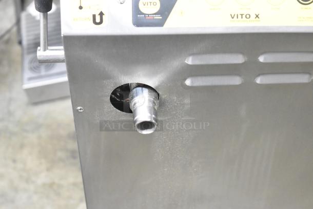 Brand new Vito XM 137 lb. mobile fryer oil filter system. Scratch and dent condition. 100-120V, 1 phase. Labels show functionality and model.