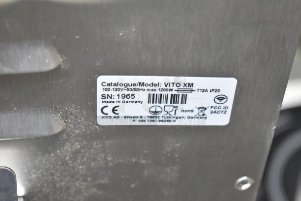 Brand new Vito Fryfilter VITO XM fryer oil filter system, 137 lb capacity, 100-120V, 1 Phase. Label shows Model VITO XM, SN: 1965, Made in Germany. FCC ID 2ACTZ, CE marked.