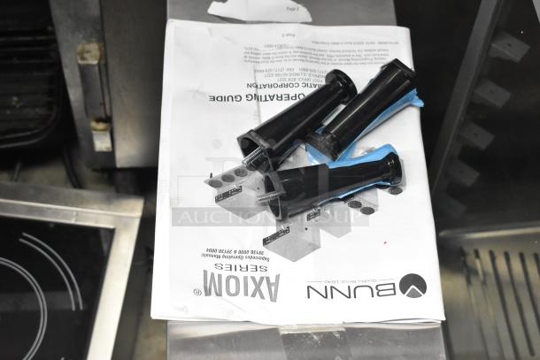 BRAND NEW 2025 Bunn SINGLE AXIOM 15 38700.0043 Coffee Brewer manual and parts. Scratch and dent condition, 120 Volts, 1 Phase.