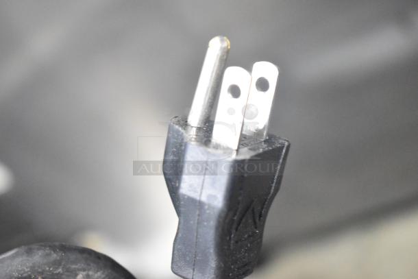 A close-up of a power plug for the Bunn SINGLE AXIOM 15 coffee brewer, 120 volts, 1 phase.