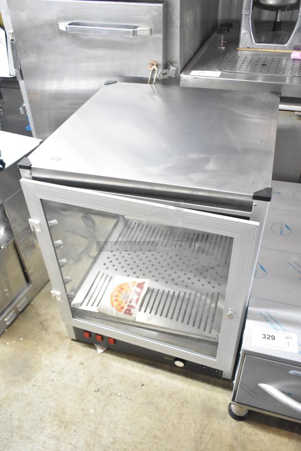 Brand new Carnival King 382HPW18D2S display warmer, missing glass panel, 120 volts, 1 phase, scratch and dent condition.