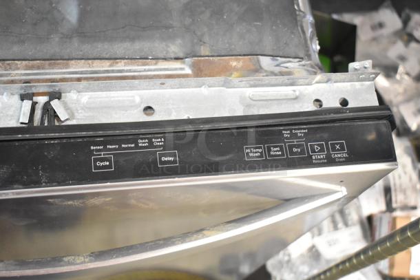 Brand new Whirlpool WDT750SAKZ2 dishwasher, scratch and dent, with control panel and various washing options visible.