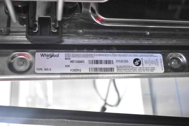 Brand new Whirlpool WDT750SAKZ2 undercounter dishwasher, scratch and dent. Label shows model and electrical details.