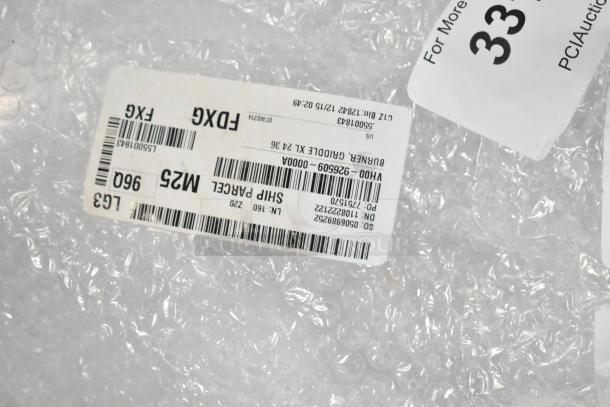 Two brand new items with shipping labels, including Hatco Tank HP044859800 and Vulcan Burner HP0092650900, on bubble wrap.