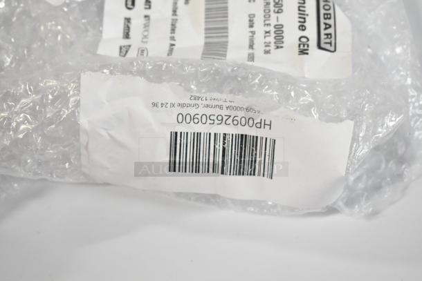 Bubble-wrapped package with visible label for Vulcan HP0092650900 burner, griddle XL 24 36; new scratch and dent condition.