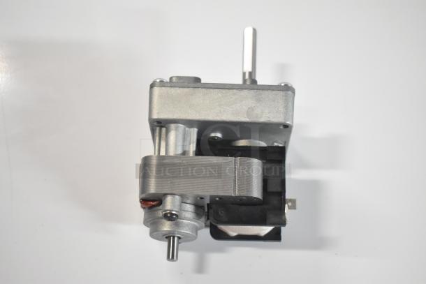 Brand new Hatco 02.12.096.00 gear motor, model HP021209600, visible scratch and dent, features durable metal construction.