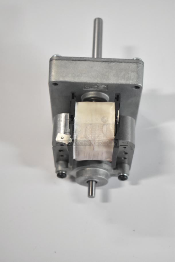 BRAND NEW Hatco 02.12.096.00 Gear Motor, slight scratches, model HP021209600, metal housing, visible shaft.