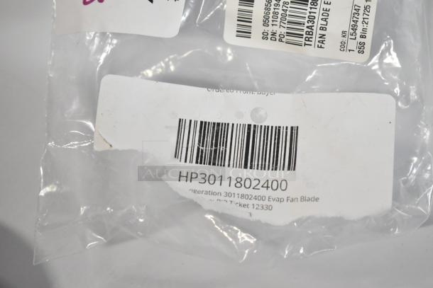 Transparent packaging showing a barcode and label for Turbo Air Refrigeration 3011802400 Evap Fan Blade HP3011802400.