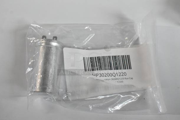 Brand new Turbo Air Refrigeration 30200Q1220 run capacitor in sealed plastic bag with barcoded label.