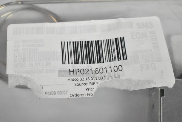 Hatco thermostat with label HP021601100, model 02.16.011.00, new condition. Barcodes and manufacturing info visible.