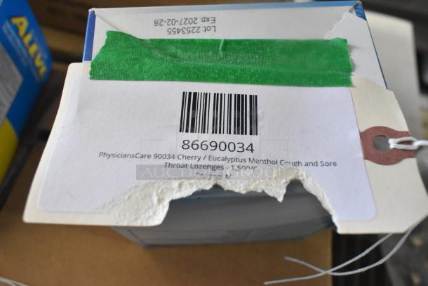 Auction lot including 11 brand new items: tweezers, medicine, bandages, and eye pads. Visible barcode and label on packaging.