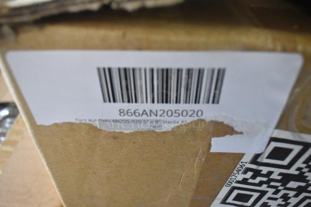 Cardboard box with label showing barcode 866AN205020. Contains 11 new scratch and dent items, including tweezers and bandages.