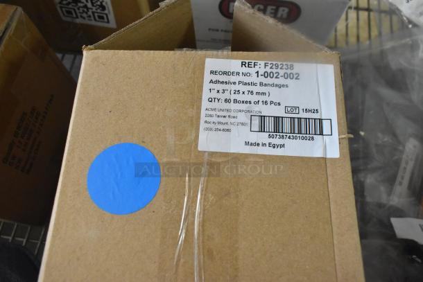 Cardboard box labeled "Adhesive Plastic Bandages," 1"x3", containing 60 boxes of 16 pieces, Made in Egypt.