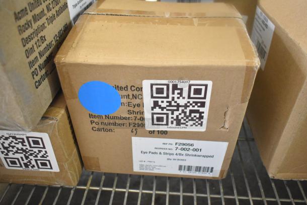 Cardboard box labeled "Eye Pads & Strips 4/Bx Shrinkwrapped". QR code, item number F29056 visible. Contains 11 new scratch and dent items.