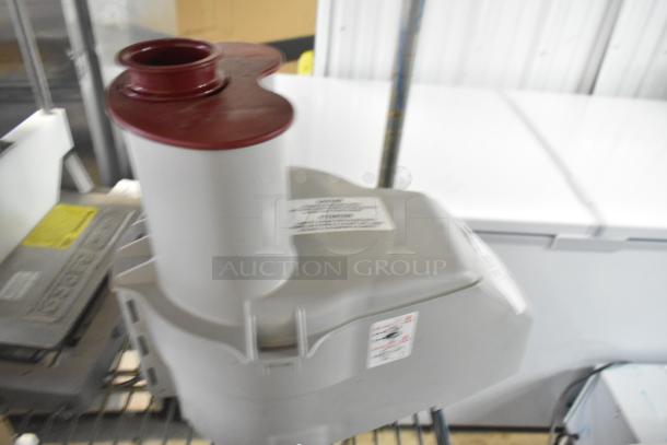 Gray Poly Continuous Feed Head for Food Processor, brand new, scratch and dent condition, with visible labels.