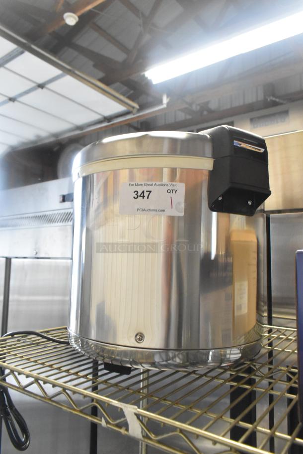 Brand new Zojirushi THA-803S 88 Cup Stainless Steel Electric Rice Warmer, removable pot. Scratch and dent condition.