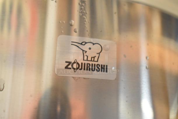 Brand new Zojirushi THA-803S stainless steel rice warmer, 88 cup capacity, with visible logo label, 120V, scratch and dent.