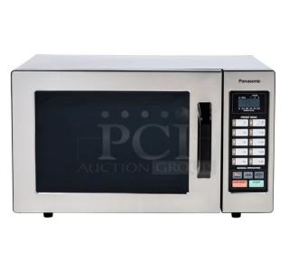 Panasonic NE-1054F commercial microwave oven in original box; stainless steel, keypad controls, excellent condition.