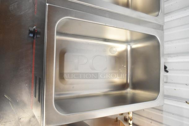 Brand new Avantco dual well electric food warmer, stainless steel, 12"x20", thermostatic controls, 120V, scratch and dent.