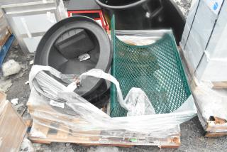 11-brand new scratch and dent items, including mop heads and trash can shells, wrapped in plastic on a pallet.