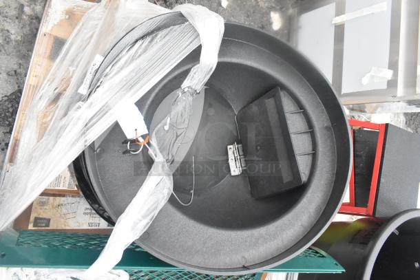 11 new scratch and dent items including mop heads and a trash can shell, wrapped in plastic.