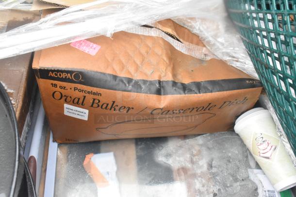 Acopa oval baker casserole dish, 18 oz porcelain, in damaged packaging with visible labeling and sticker.