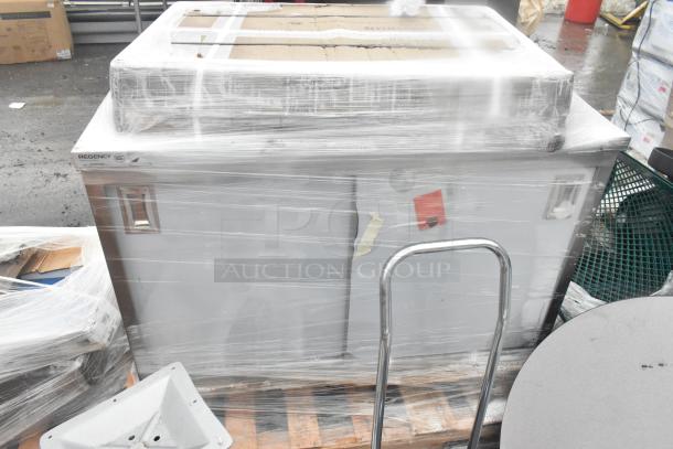 Brand new items wrapped in plastic, including a Regency table and wire shelves. Visible NSF certification label. Scratch and dent condition.