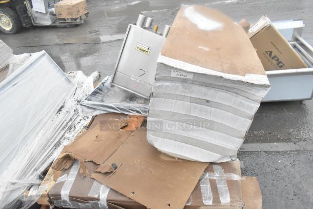 Four new scratch and dent items, including an ice bin and shelves, in original packaging with visible caution and reference labels.