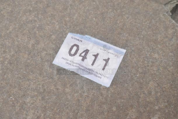 Auction item showing a paper label with the number 0411. Includes scratch and dent ice bin and shelves.