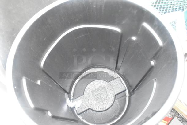 Rubbermaid black poly trash can, durable construction, good condition, no visible damage, ideal for home or commercial use.