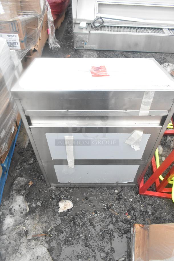 Brand new Regency 600WCS1524 24" stainless steel wall cabinet with sliding doors, scratch and dent condition.