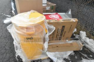 13 brand new scratch and dent items, including Lavex trash can, Lancaster table top. Items in original packaging.