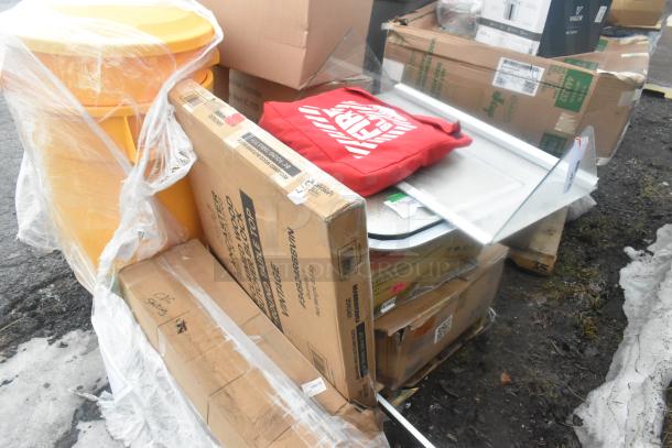 13 brand new scratch and dent items including bandage wrap and eyewash station. Multiple packaged boxes visible.