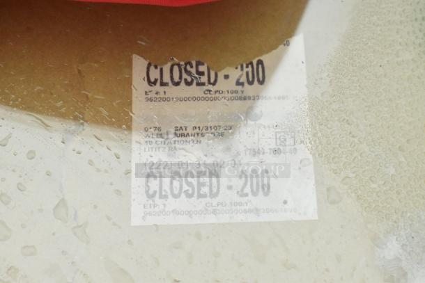 Image showing a label marked "CLOSED-200" with water droplets. Set includes 13 new scratch and dent items like bandage wrap and eyewash station.