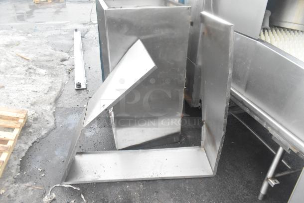5' commercial grease hood with lights; stainless steel; used condition; visible dents and scratches; outdoor setting.