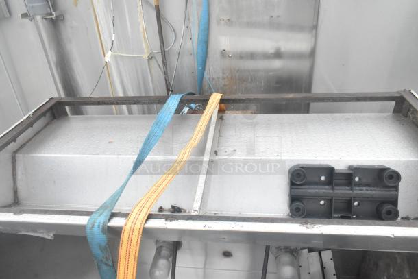 5' commercial grease hood with lights, metal construction, visible wear, equipped with wiring and supports for installation.