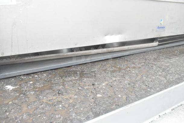 Berner Air Curtain, stainless steel, visible brand label, moderate wear on surface, designed for commercial use.