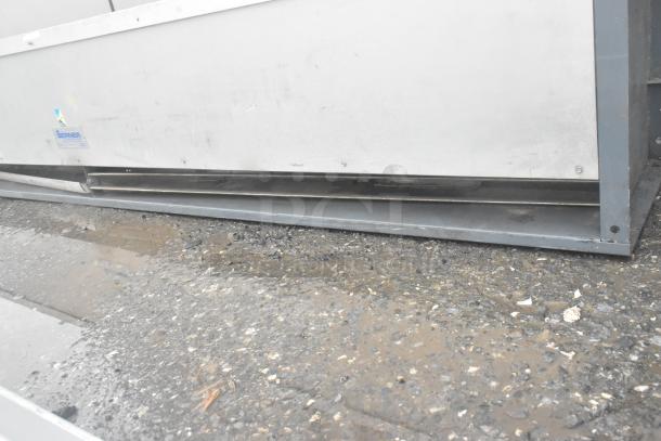 Berner Air Curtain with visible logo on metal exterior. Appears in used condition, surface has minor wear. Suitable for door installations.